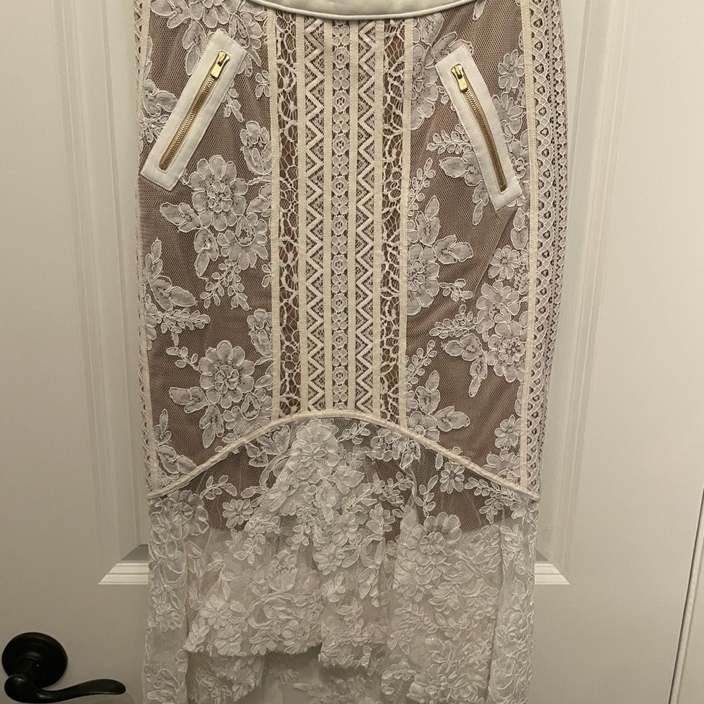 Three floor midi white skirt